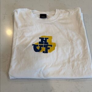 HUF White Tee with Blue and Yellow Logo